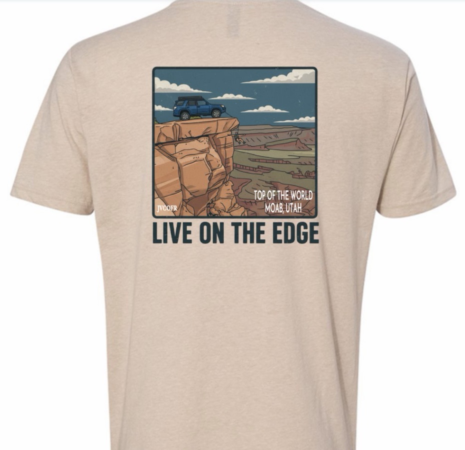 Back of the cream JVC 'Live on the Edge' tee showing a 4Runner perched on a Moab cliff